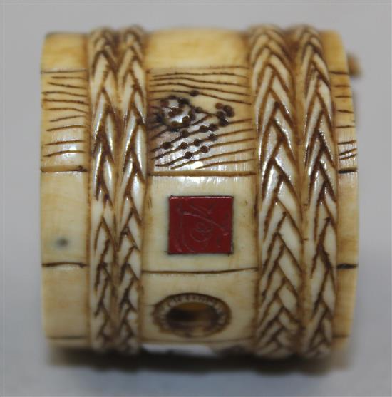 A Japanese ivory netsuke of two men constructing a barrel, Meiji period, 2.8cm